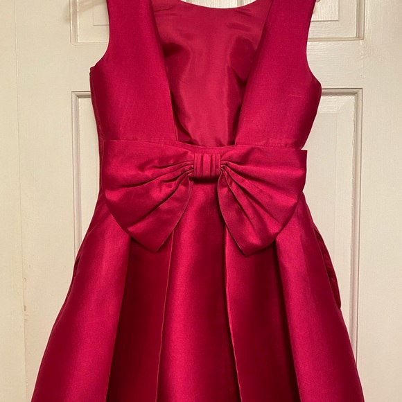 Kate Spade fushia dress size 2.  Backless fit and flare with large bow - Picture 2 of 2